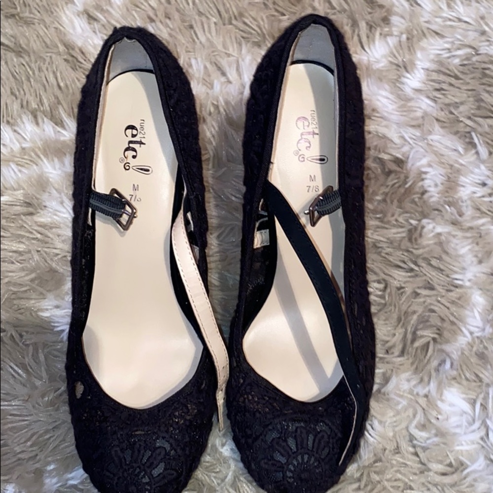 Black lace heeled shoes